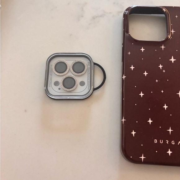 1phone 15 pro hard case with ring holder and special glam lenses 
Brand new - Picture 2 of 2